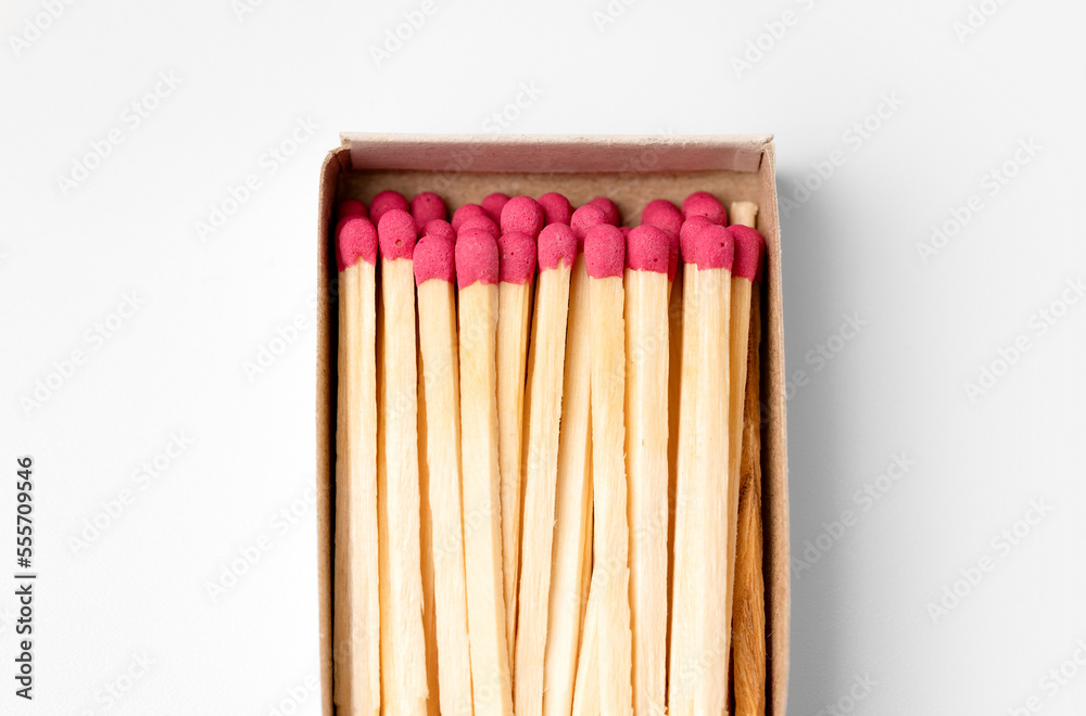 Matches macro. Open matchbox close-up on a white background.