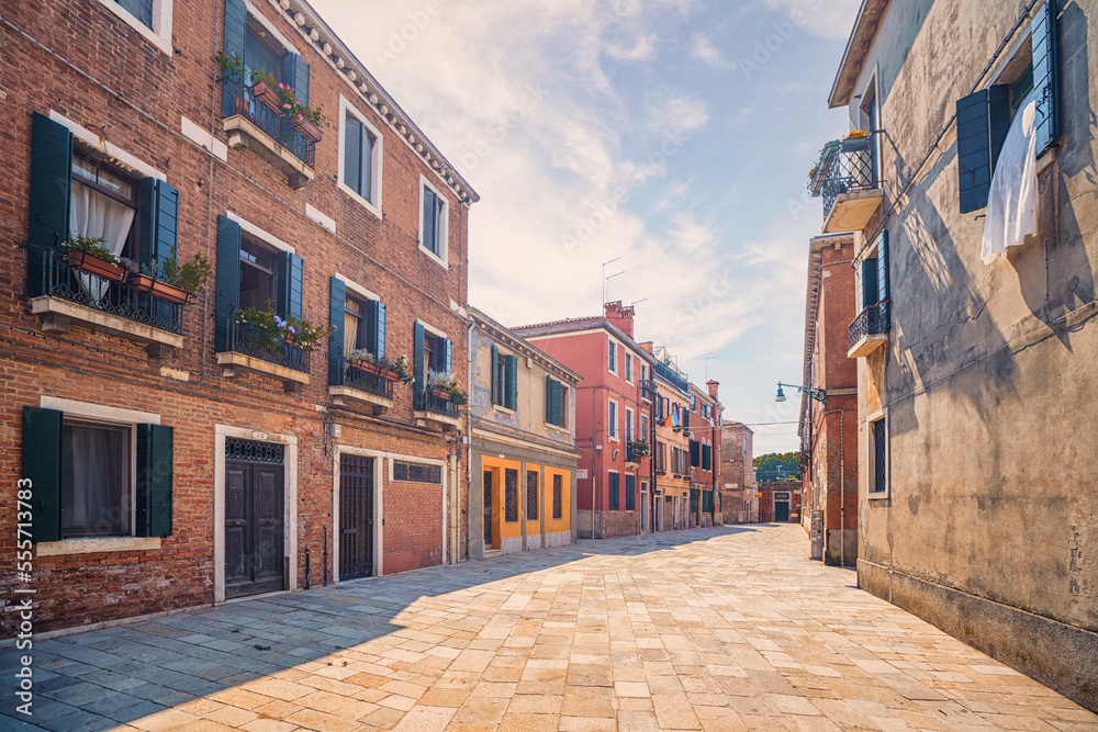 Italian street with colorful buildings in Venice Italian street with colorful buildings in Venice