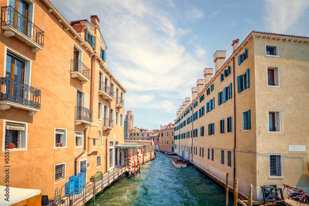 River canal in Venice Italy with balconys and windows