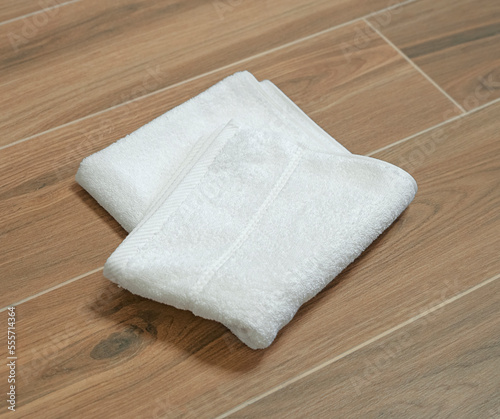 White terry towel on a wooden table