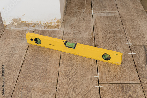 Carpenter level placed on floor
