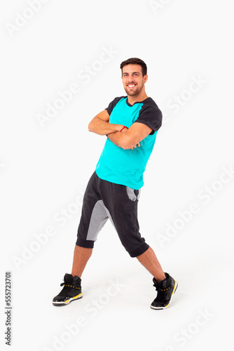 Happy fitness instructor. Happy zumba instructor. Male fitness model. © Luluraschi