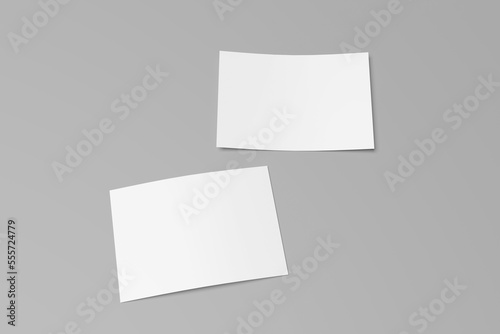 Blank white a6 postcard mockup with texture and shadow isolated on white background. 3d rendering  © graphicell