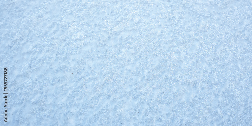 Blue and white clean snow background outdoor in winter time. Textured backdrop of fresh snow. Blue and white clean snow background outdoor in winter time. Textured backdrop of fresh snow.