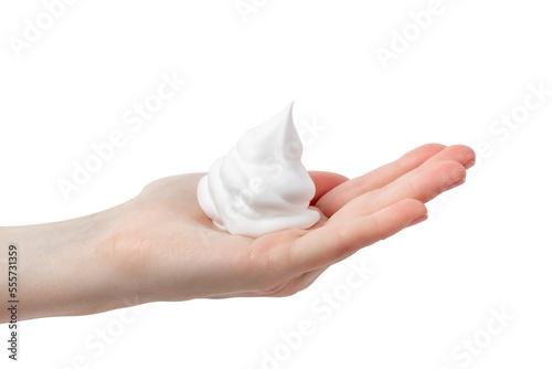 The hand holds shaving foam. Shaving foam on hand. Shaving cream isolated on white photo
