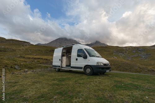 Beautiful mountain landscape near Gavarnie with camper van on meadow at Col de Tentes in the Pyrenees with peak of Taillon, Nouvelle-Aquitaine, France photo