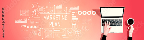 Marketing plan theme with person using a laptop computer