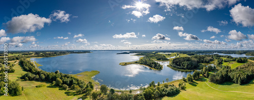 Latgale. A summer day in the Latvian countryside by Lake Sivers. Panorama.