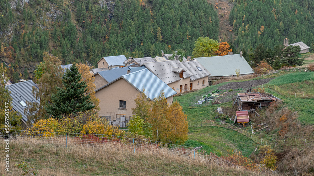 Autumn landscape in the mountains on hike from the hamlet of Les Cours to Lac du Pontet and back, near Villar d'Arene and Col du Lautaret, Hautes-Alpes, France