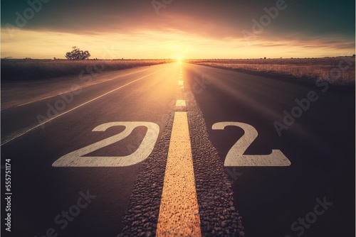 New year 2023 or start straight concept.Text 2023 written on the road in the middle of asphalt road at sunset.Concept of planning,business strategy,opportunity,hope,new life. Generative AI
