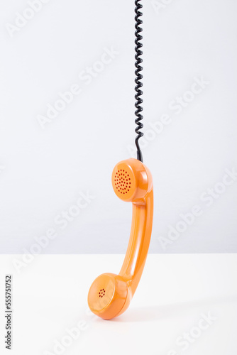 Orange Telephone Receiver photo