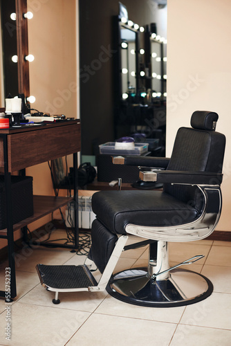 Client's stylish barber chair. barber shop interior