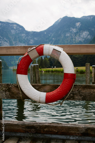 Life Preserver Hanging on Dock at Lake, Bavaria, Germany photo