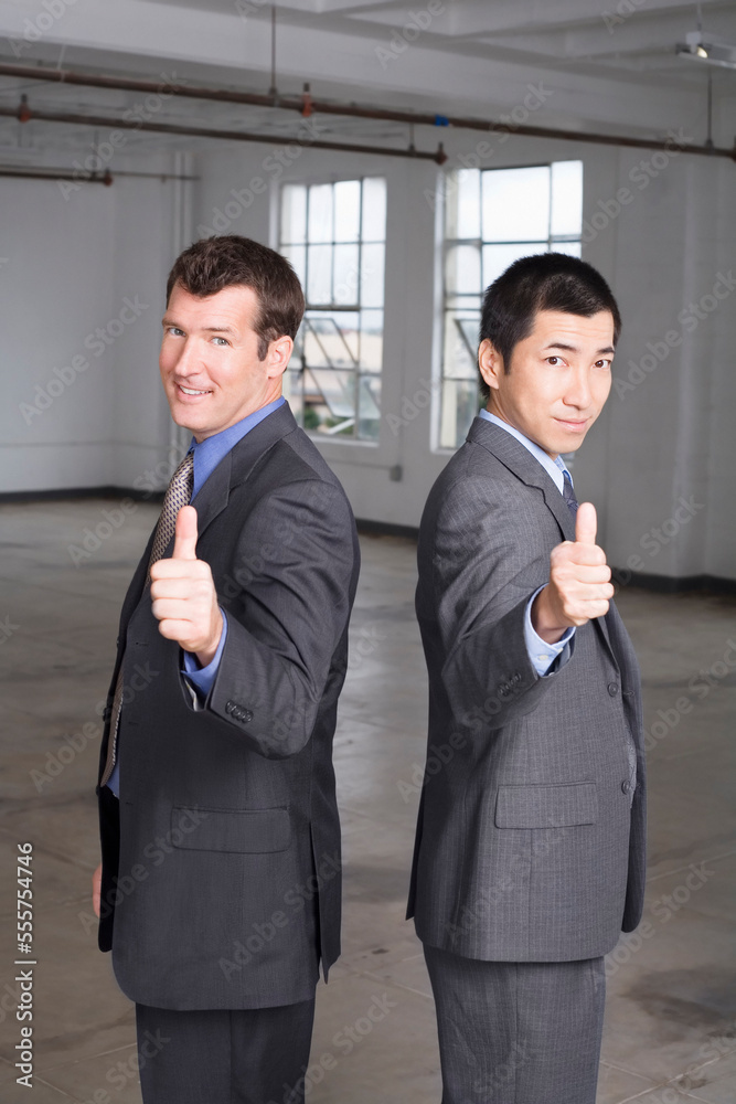 Portrait of Businessmen making Hand Gestures Portrait of Businessmen making Hand Gestures