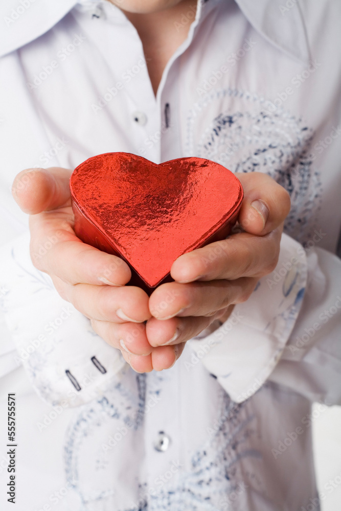 Man Holding Heart-Shaped Box Man Holding Heart-Shaped Box