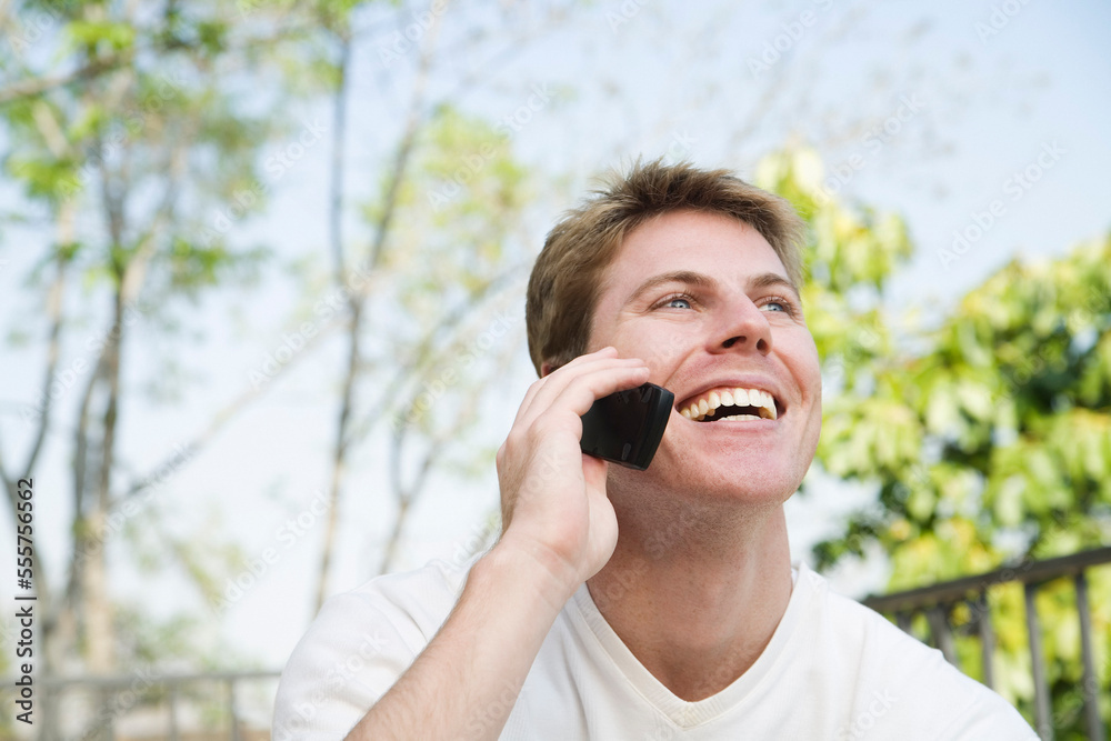 Man Using Cellular Phone Man Using Cellular Phone