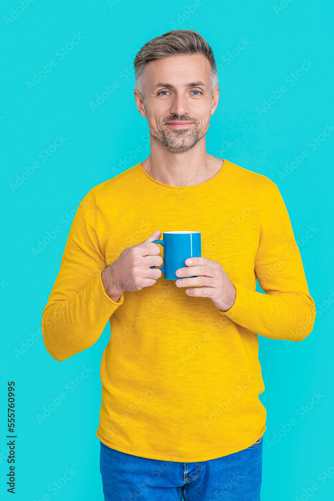 happy mature man at coffee break on background. photo of mature man at coffee break.