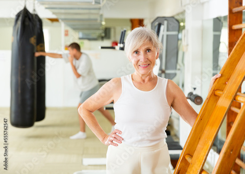 Portrait of mature woman in the gym for self defense exercises