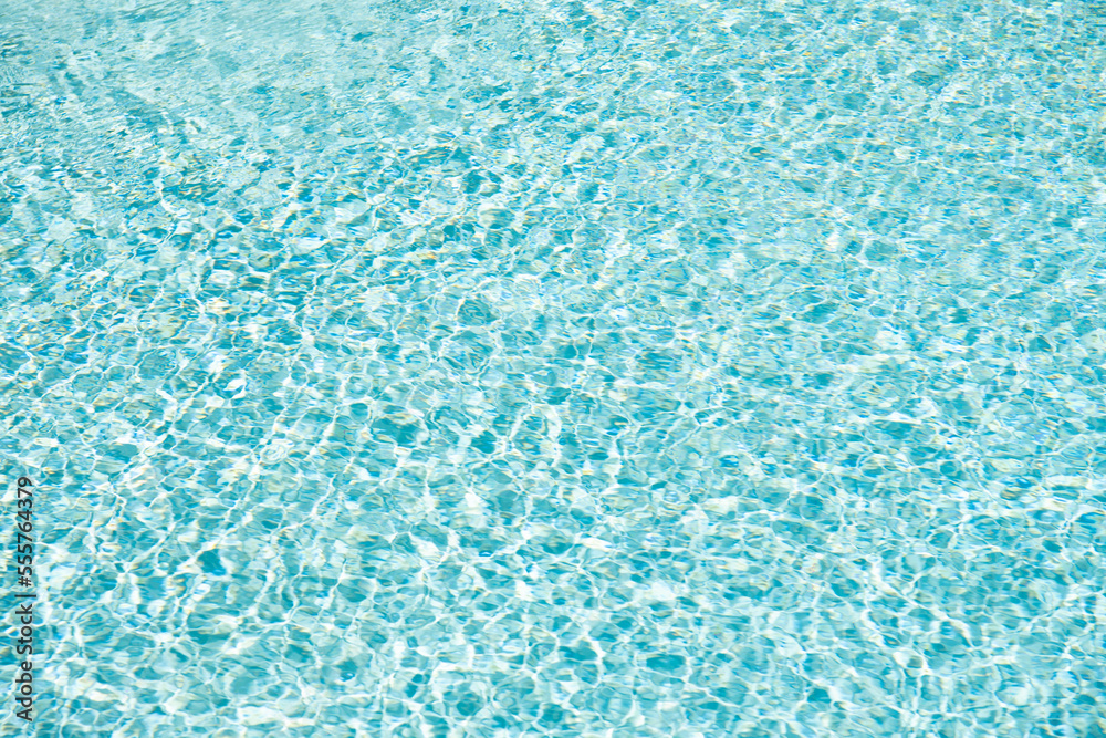 blue color background of swimming pool water with ripples in maldives