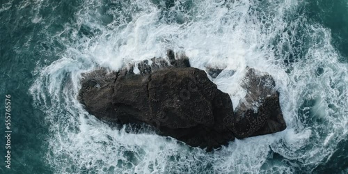 Waves Crashing over rocks in the Ocean