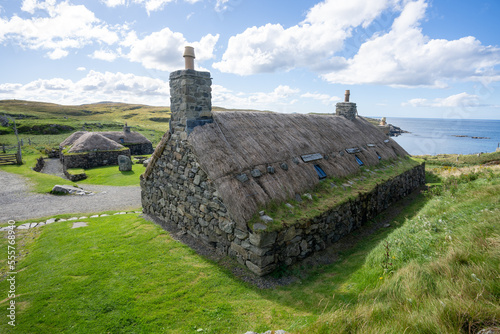 Gearrannan Blackhouse village houses with thatched roofs on the Isle of Lewis Scotland photo