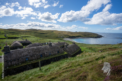 Gearrannan Blackhouse village houses with thatched roofs on the Isle of Lewis Scotland photo