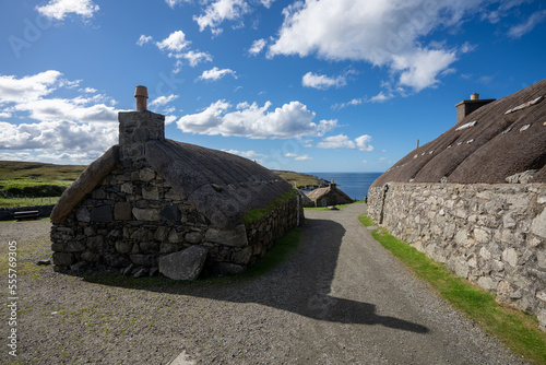 Gearrannan Blackhouse village houses with thatched roofs on the Isle of Lewis Scotland photo