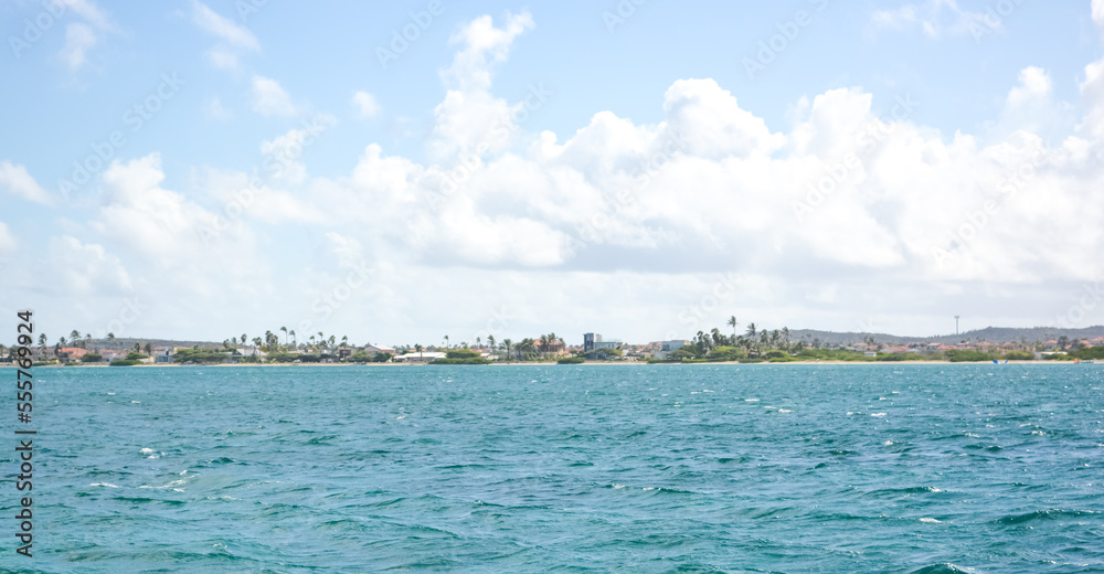 A beautiful coastal view on Aruba island from Caribbean sea. Space for text. 