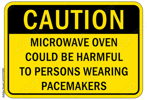 Electrical warning sign and labels microwave oven could be harmful to person wearing pacemaker