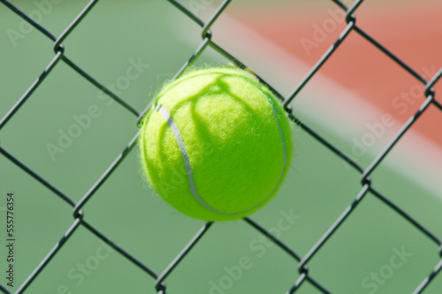 Tennis Ball Stuck in Chain Link Fence