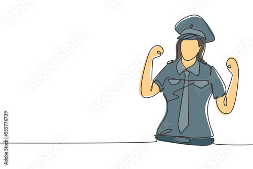 Single continuous line drawing female pilot with celebrate gesture and full uniform ready to fly with cabin crew in aircraft at international airport. One line draw graphic design vector illustration
