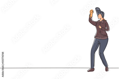 Continuous one line drawing female welder stands with celebrate gesture and face shield is removed ready to work in iron workshop. Success business. Single line draw design vector graphic illustration
