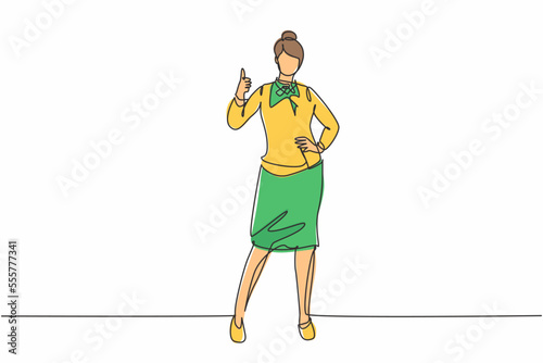 Single one line drawing of flight attendant stands in a uniform with thumbs-up gesture at the airport with the crew flying to their destination. Continuous line draw design graphic vector illustration