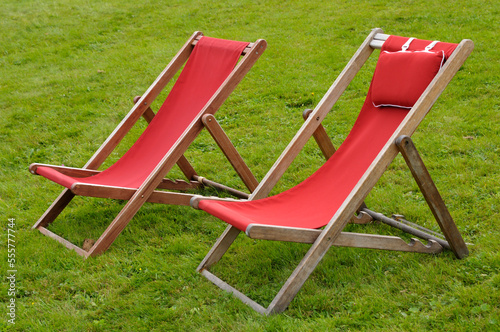 Canvas Lawn Chairs on Grass, Alps, France photo