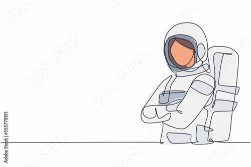 Continuous one line drawing of young female astronaut in space suit pose cross arms on chest. Professional job profession minimalist concept. Single line draw design vector graphic illustration