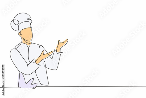 Single continuous line drawing of young friendly man chef in uniform pose serving menu at screen display. Online food restaurant banner concept one line drawing design vector graphic illustration