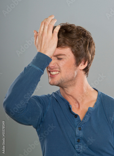 Man Hitting Forehead