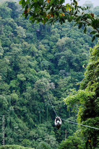 Tourist Descending on Zip Line, Costa Rica photo