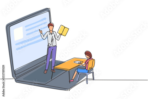 Single one line drawing male teacher standing in front of laptop screen holding book and teaching female junior high school students sitting on benches around desk. Draw design graphic illustration