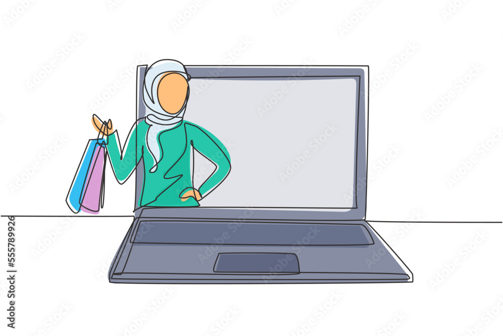 Single one line drawing young Arabian woman coming out of laptop screen holding shopping bags. Digital lifestyle and consumerism concept. Modern continuous line draw design graphic vector illustration