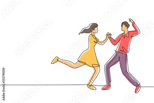 Continuous one line drawing happy couple man and woman performing dance at school, studio, party. Male and female characters dancing tango together. Single line draw design vector graphic illustration