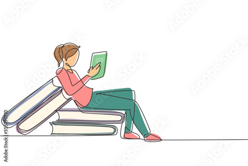 Single continuous line drawing young female reading, learning and sitting on big books. Study in library. Literature fans, student, education concept. One line draw graphic design vector illustration