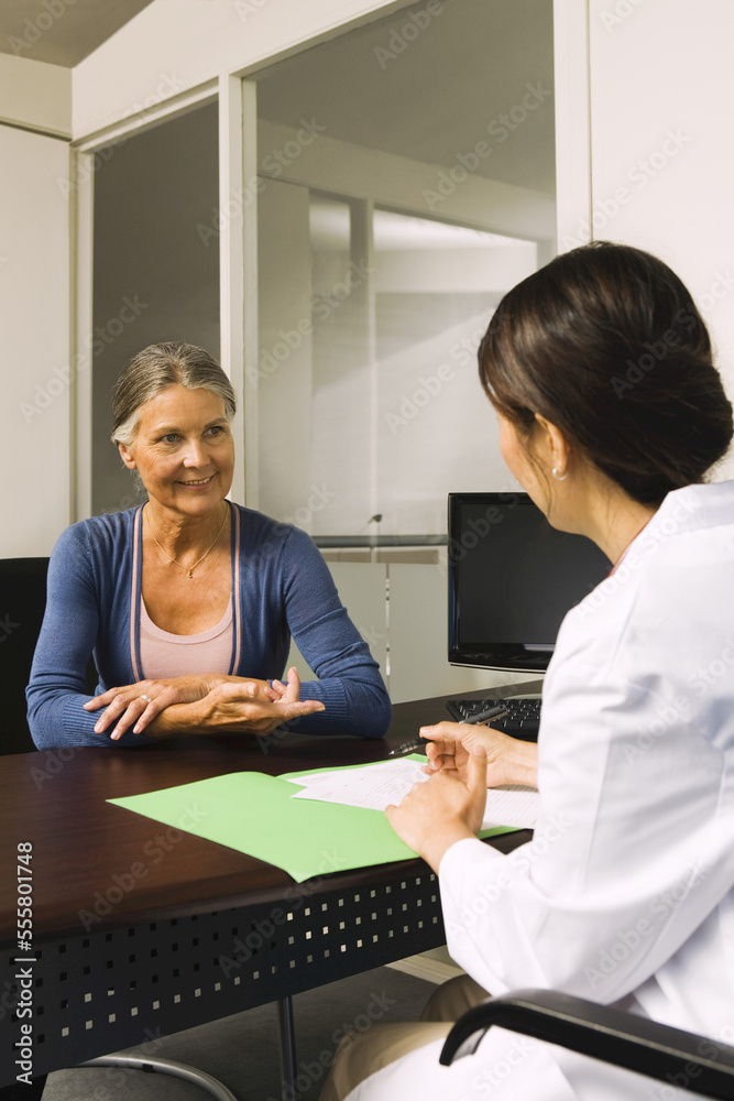 Woman Talking to Doctor