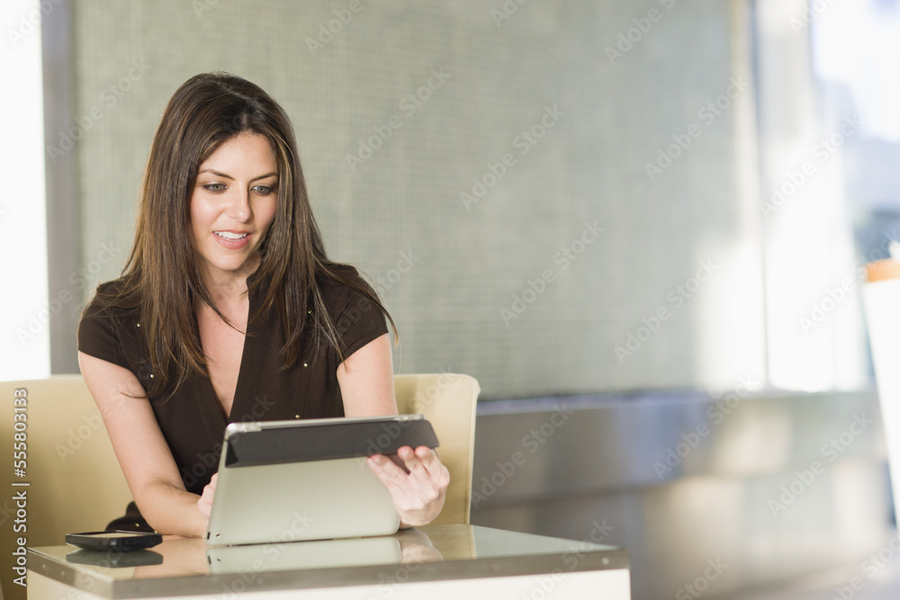 Woman Using Tablet Computer, Florida, USA Woman Using Tablet Computer, Florida, USA