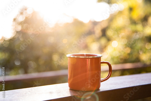 camping mug at sunrise
