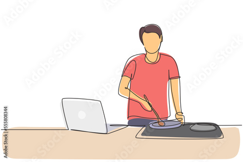 Single continuous line drawing man cooking dinner has video call conversation in kitchen. Male talking with friend using application on laptop. Dynamic one line draw graphic design vector illustration