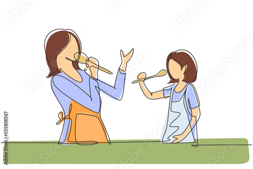 Single one line drawing cheerful mom and her little daughter singing while cooking together, using spatula and broccoli as microphones. Modern continuous line draw design graphic vector illustration