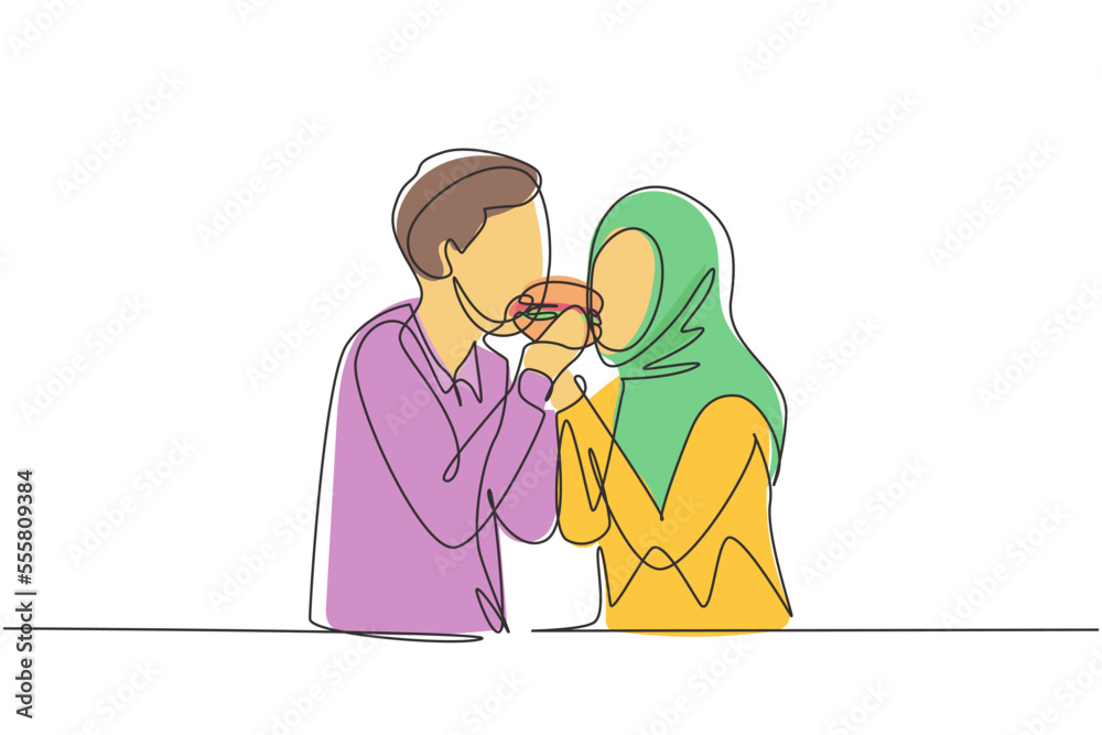 Single one line drawing young Arabian couple sharing hamburger. Celebrate wedding anniversaries and enjoy romantic lunch at restaurant. Modern continuous line draw design graphic vector illustration Single one line drawing young Arabian couple sharing hamburger. Celebrate wedding anniversaries and enjoy romantic lunch at restaurant. Modern continuous line draw design graphic vector illustration