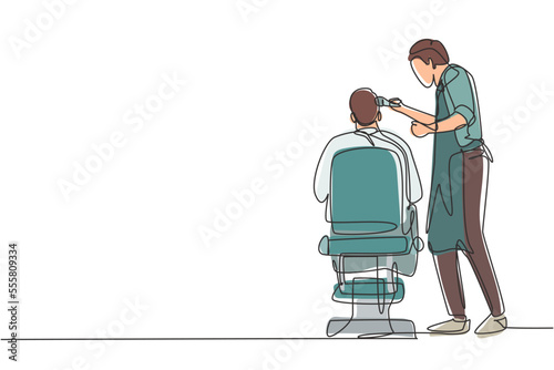 Continuous one line drawing rear view shot of handsome hairdresser cutting hair of young male client. Hairstylist serving client at barber shop. Single line draw design vector graphic illustration