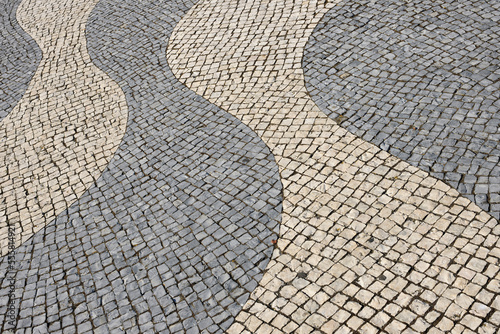 Close-up of the mosaic pavement patterns in front of Monument to the Discoveries in Lisbon, Portugal photo